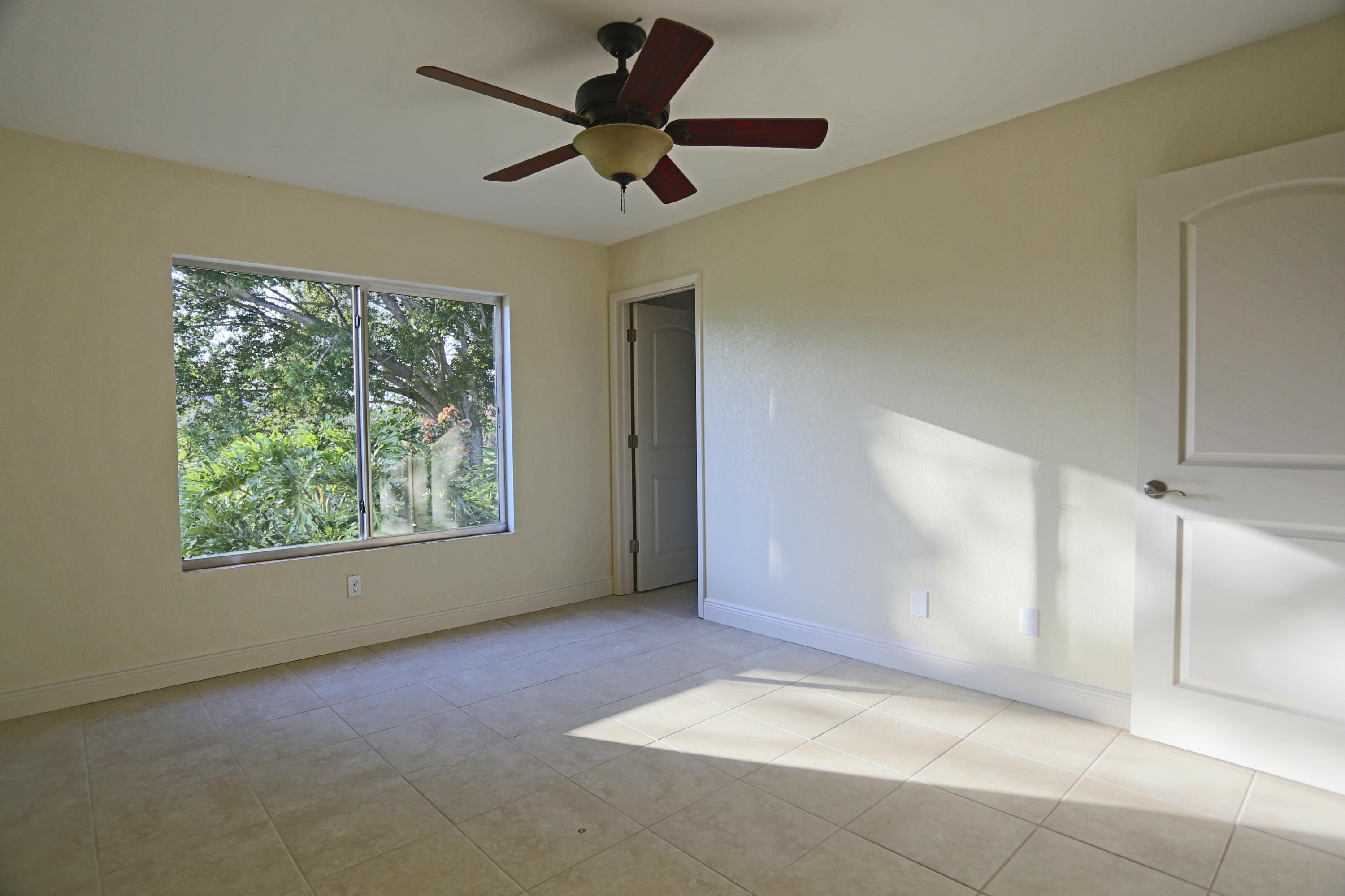 2492 Southeast Wishbone Road Port St. Lucie, FL 34952 - Photo 22 of 27 IMG_0653 Master Bedroom 2
