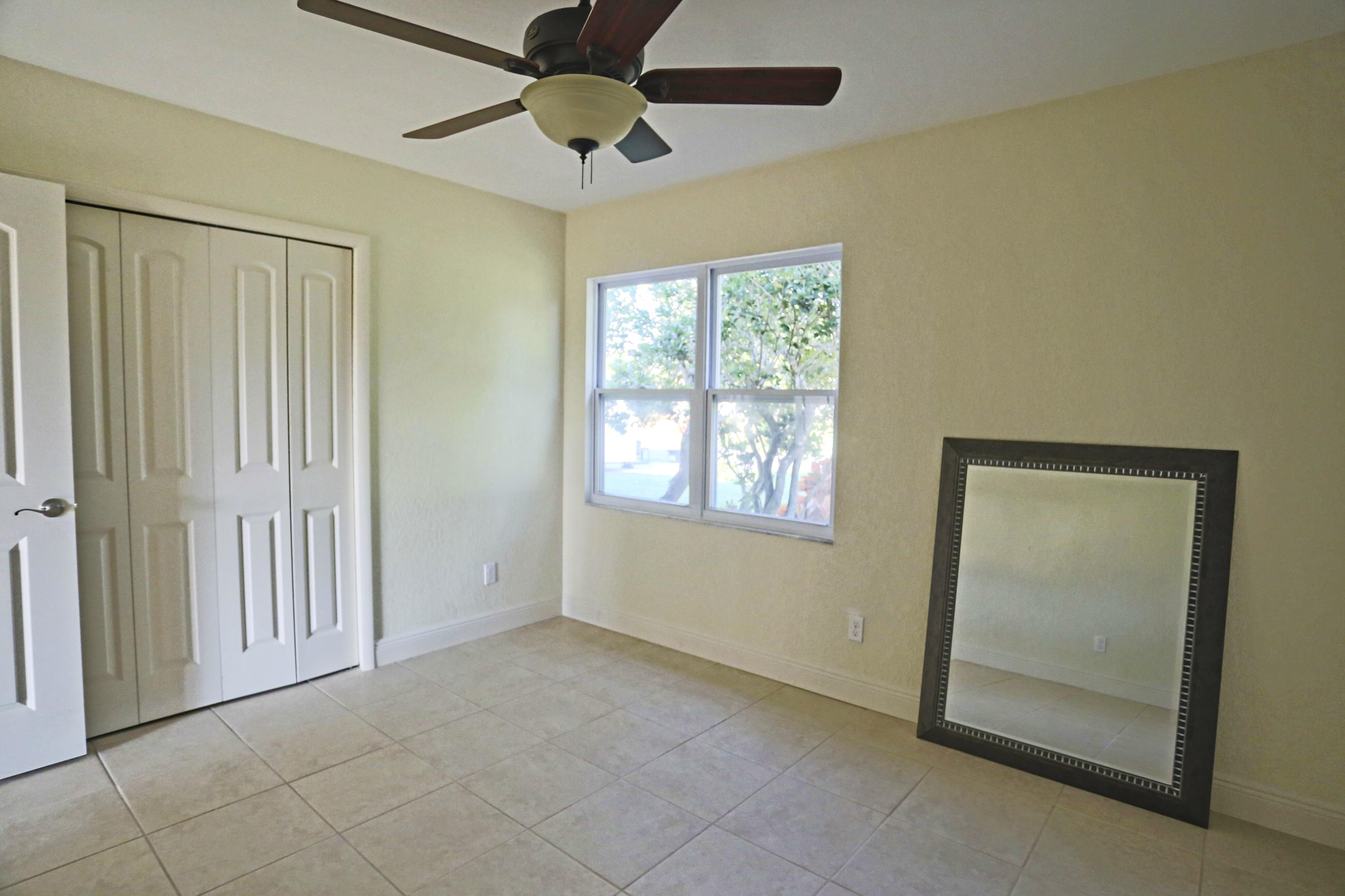 2492 Southeast Wishbone Road Port St. Lucie, FL 34952 - Photo 23 of 27 IMG_0654 Bedroom Two