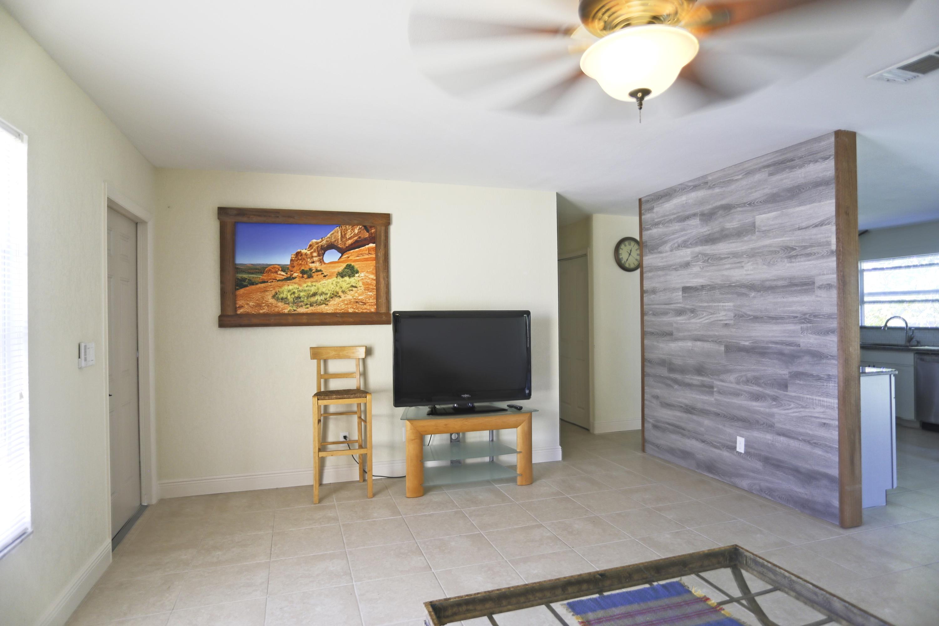 2492 Southeast Wishbone Road Port St. Lucie, FL 34952 - Photo 3 of 27 IMG_0673 LivingRoom Hallway