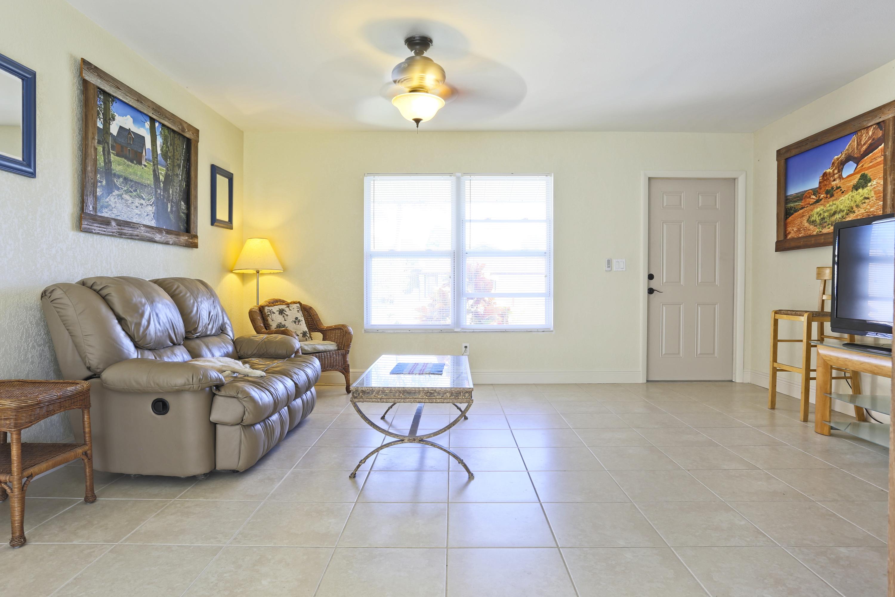 2492 Southeast Wishbone Road Port St. Lucie, FL 34952 - Photo 5 of 27 IMG_0732 Living Room Entry