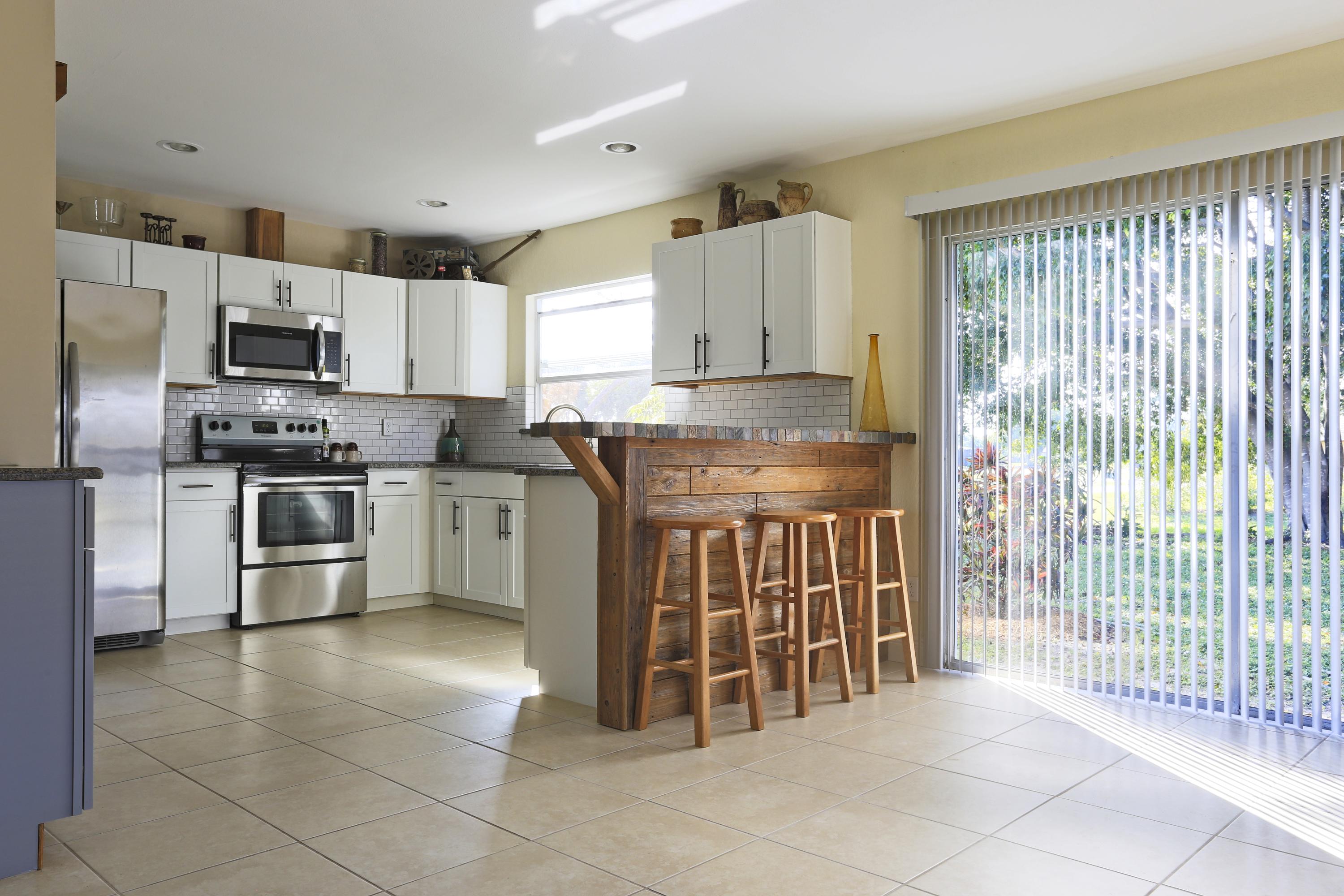 2492 Southeast Wishbone Road Port St. Lucie, FL 34952 - Photo 7 of 27 IMG_0754 Kitchen Bar