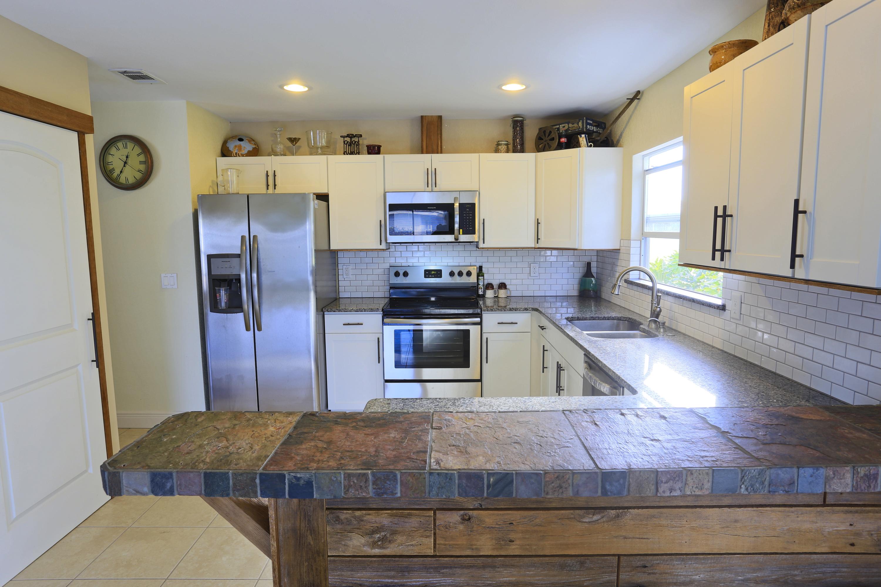 2492 Southeast Wishbone Road Port St. Lucie, FL 34952 - Photo 10 of 27 IMG_0787 Kitchen Bar Detail
