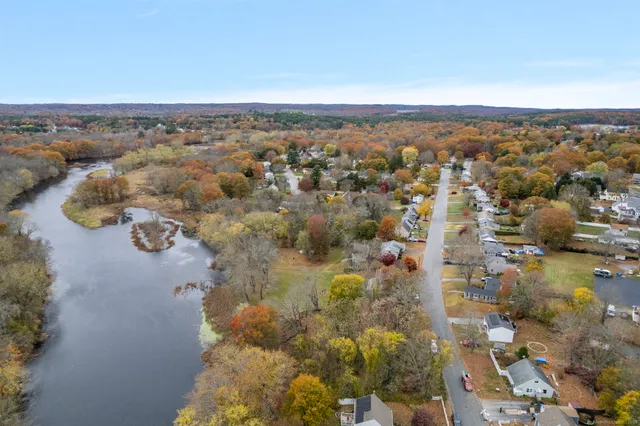 an aerial view of residential house and outdoor space