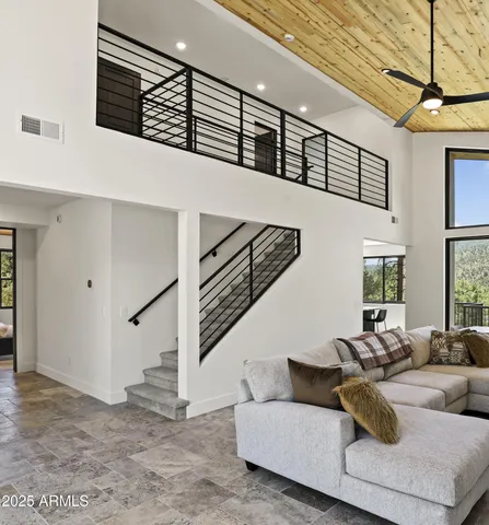 a view of livingroom with furniture and window