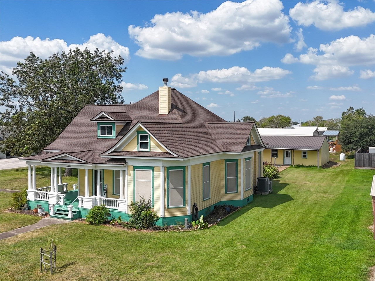 570 Wightman Street Matagorda, TX 77457 - Photo 26 of 29 a front view of a house with a yard table and chairs