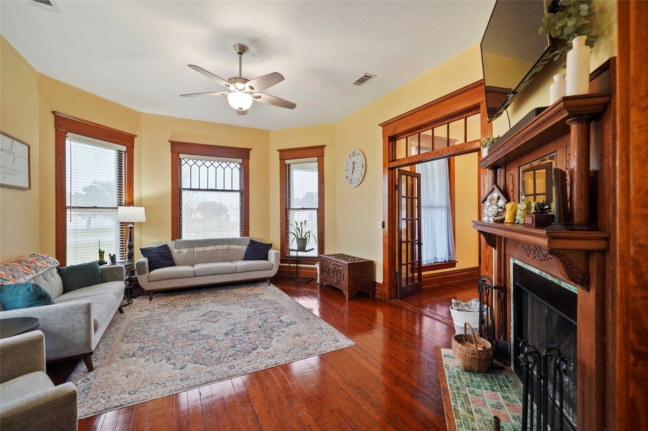 570 Wightman Street Matagorda, TX 77457 - Photo 8 of 29 a living room with furniture and a fireplace