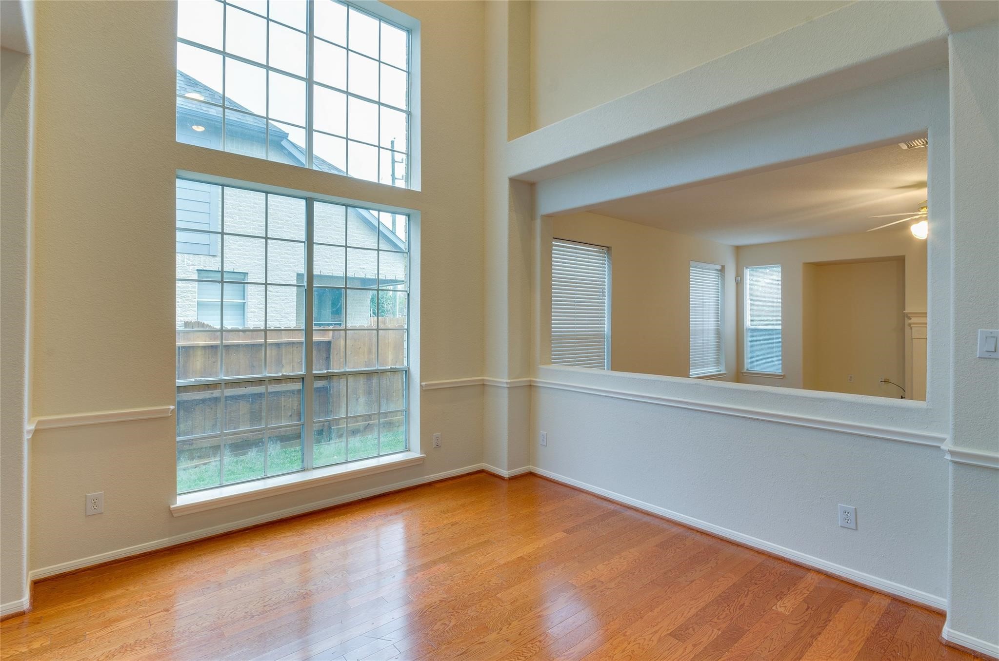 4019 Angel Spring Drive Sugar Land, TX 77479 - Photo 7 of 50 wooden floor in an empty room with a window