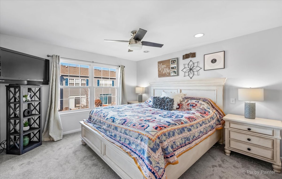 2464 Golf Ridge Circle, Unit 2464 Naperville, IL 60563 - Photo 18 of 28 a bedroom with a bed and a window