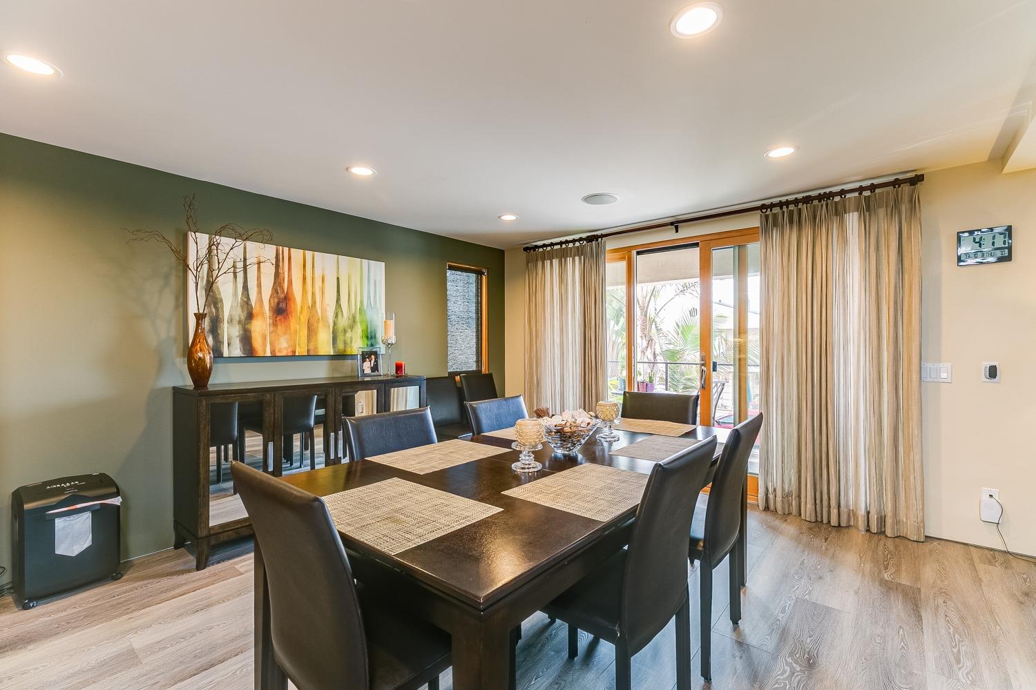 144 Pasadena Avenue Oxnard, CA 93035 - Photo 12 of 42 a view of a a dining room with furniture window and wooden floor