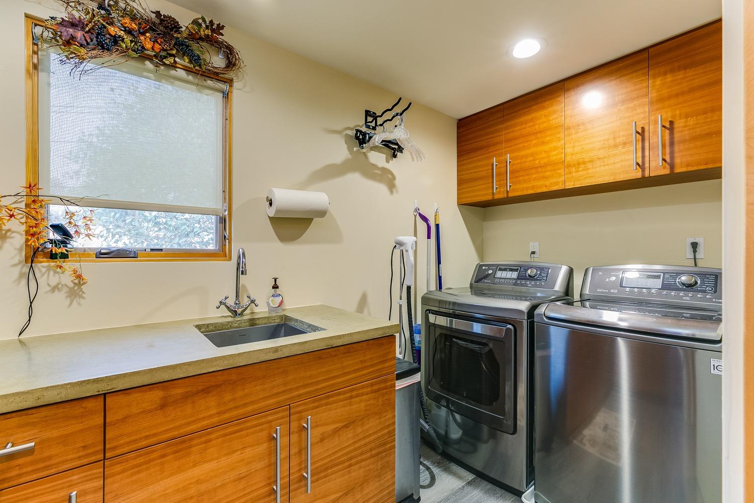 144 Pasadena Avenue Oxnard, CA 93035 - Photo 19 of 42 a kitchen with stainless steel appliances granite countertop a sink and a stove