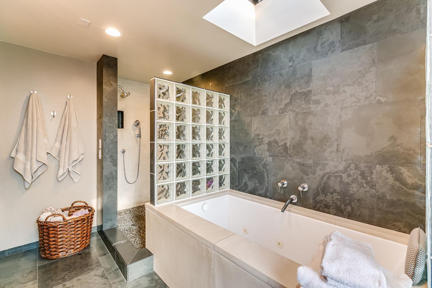 144 Pasadena Avenue Oxnard, CA 93035 - Photo 25 of 42 a bathroom with a bathtub and shower