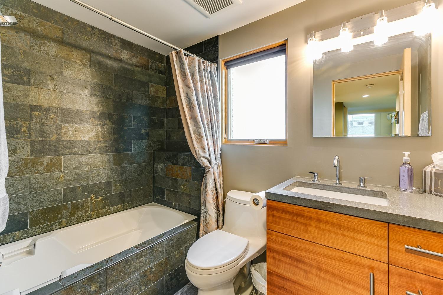 144 Pasadena Avenue Oxnard, CA 93035 - Photo 28 of 42 a bathroom with a sink and a mirror