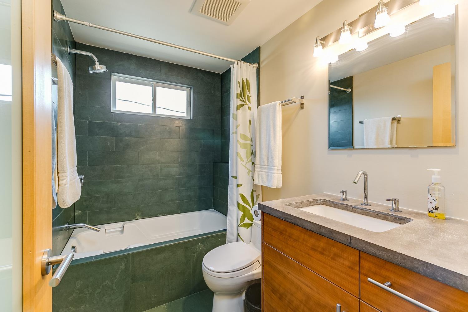 144 Pasadena Avenue Oxnard, CA 93035 - Photo 30 of 42 a bathroom with a sink toilet and shower