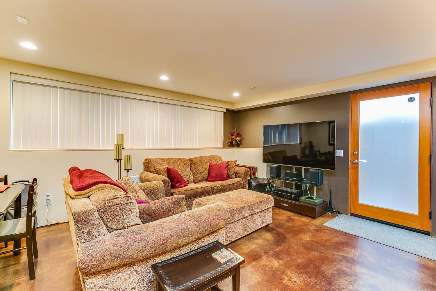 144 Pasadena Avenue Oxnard, CA 93035 - Photo 33 of 42 a living room with furniture kitchen view and a window