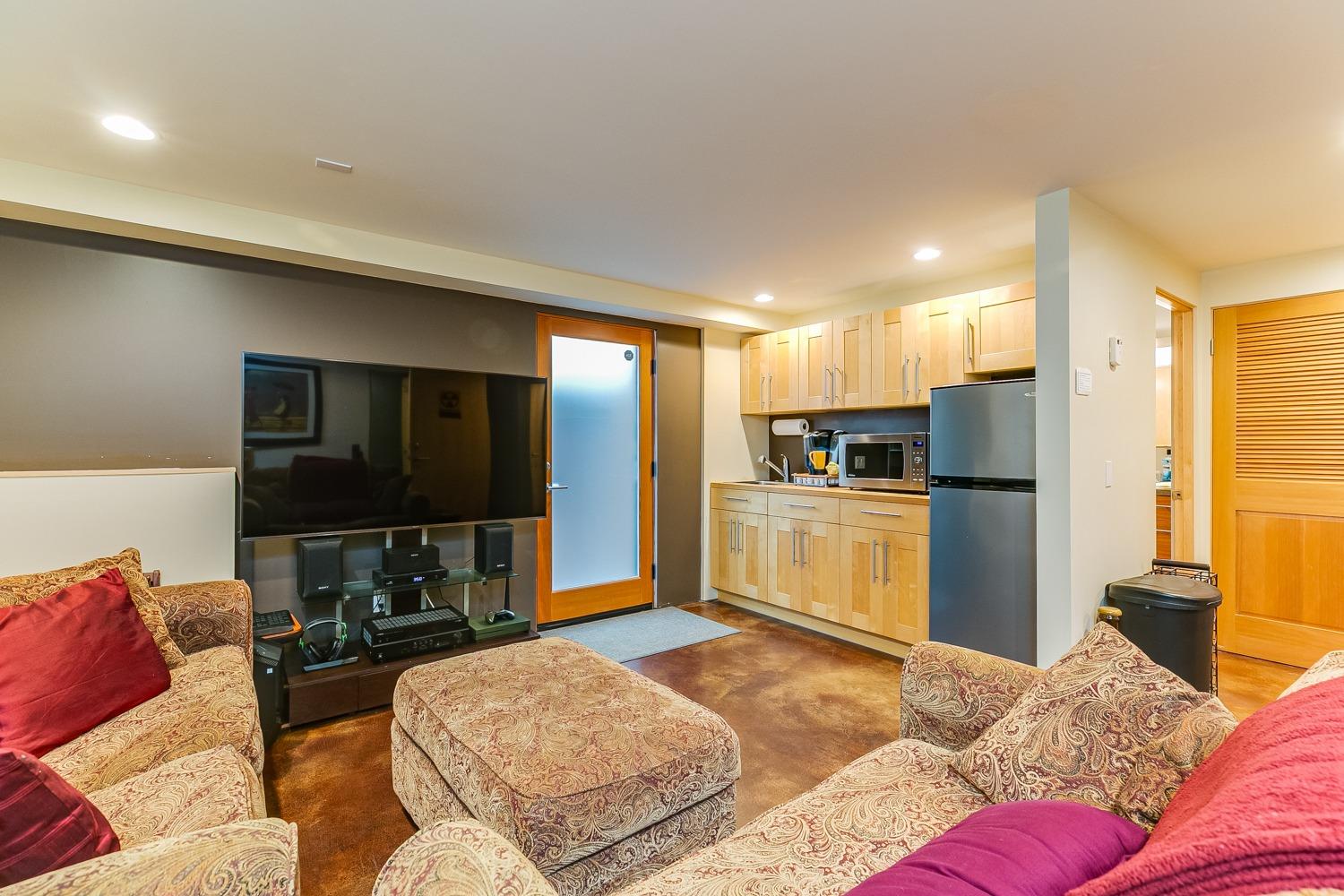 144 Pasadena Avenue Oxnard, CA 93035 - Photo 34 of 42 a living room with furniture and a flat screen tv