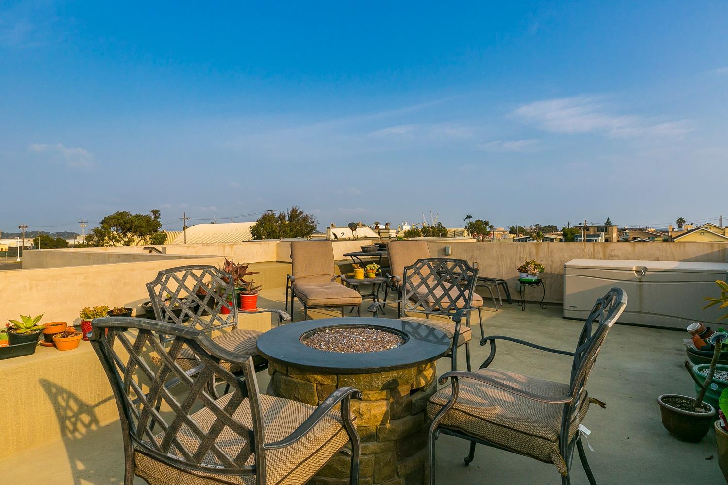 144 Pasadena Avenue Oxnard, CA 93035 - Photo 39 of 42 a view of a chairs and table in patio