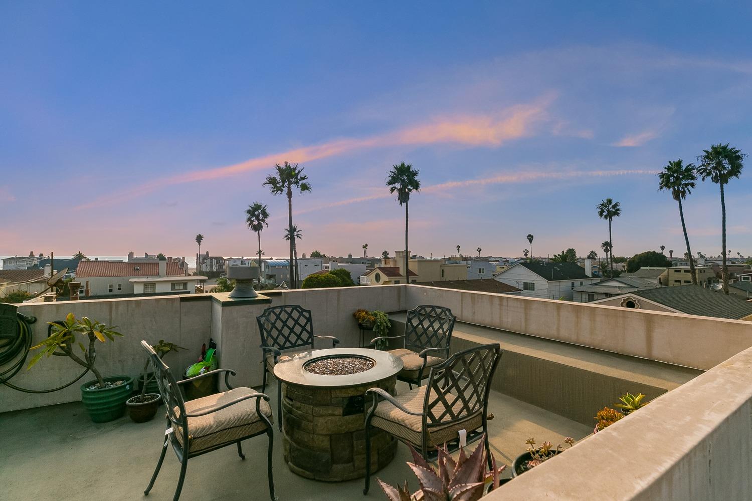 144 Pasadena Avenue Oxnard, CA 93035 - Photo 40 of 42 a view of a chairs and table in patio