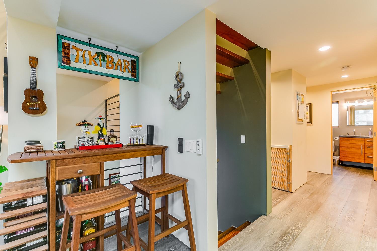 144 Pasadena Avenue Oxnard, CA 93035 - Photo 9 of 42 a view of a hallway to a livingroom and furniture