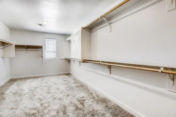 a view of a room with racks on the wall