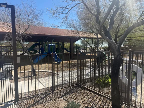 a view of a brick house with a large window
