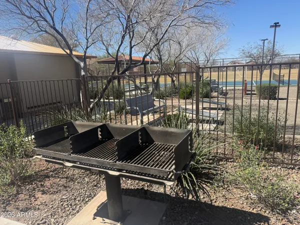 a view of balcony with wooden floor