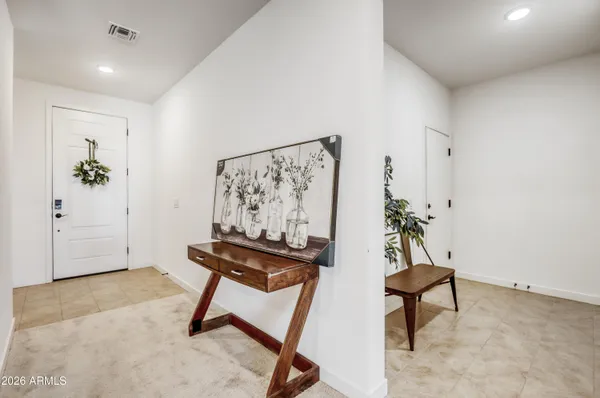 a view of workspace with furniture and a potted plant