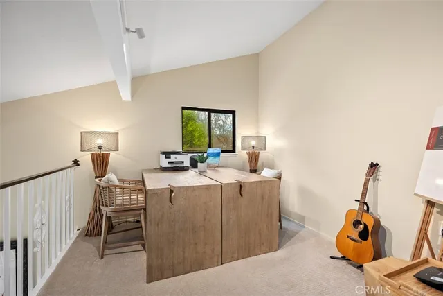 a living room with a couch and a window