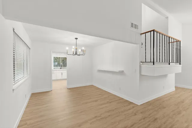 a view of kitchen with wooden floor