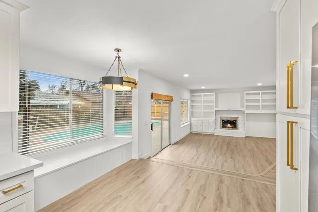 a bathroom with a sink and a washer dryer
