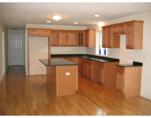 Lot 1 Harbor Trace Road Townsend, MA 01469 - Photo 2 of 6 a kitchen with stainless steel appliances granite countertop a stove a sink and a refrigerator