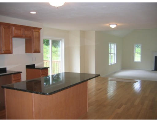 Lot 1 Harbor Trace Road Townsend, MA 01469 - Photo 3 of 6 a view of kitchen with granite countertop cabinets and sink