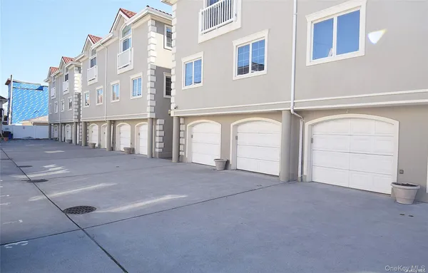 a view of a balcony with wooden floor