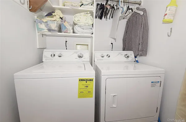 a bathroom with a granite countertop sink a shower and a mirror