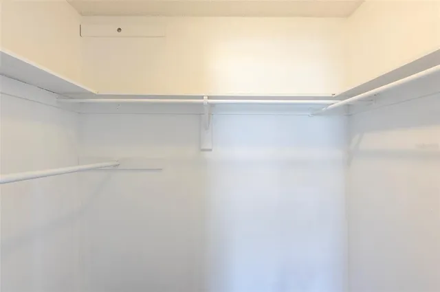 a view of small space with racks on the wall