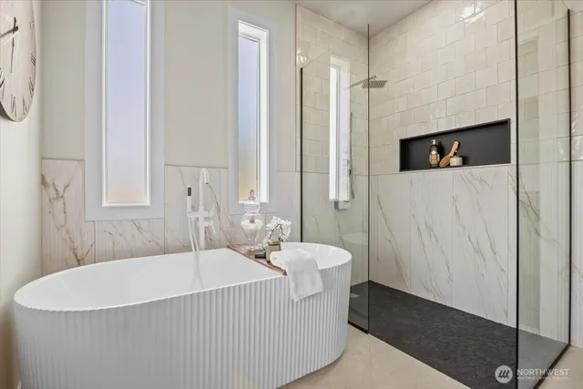 a bathroom with a sink a toilet and bathtub