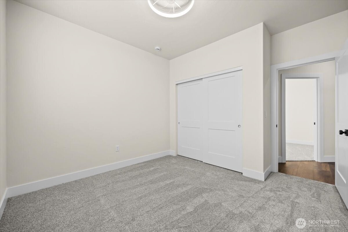 1040 South Florida Place Kennewick, WA 99338 - Photo 30 of 33 an empty room with wooden floor