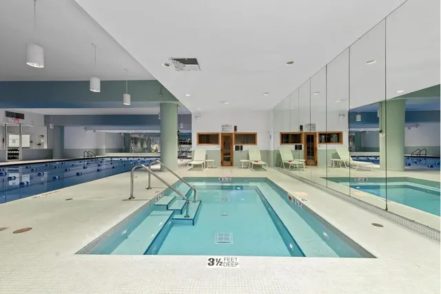 a view of a refrigerator in a kitchen