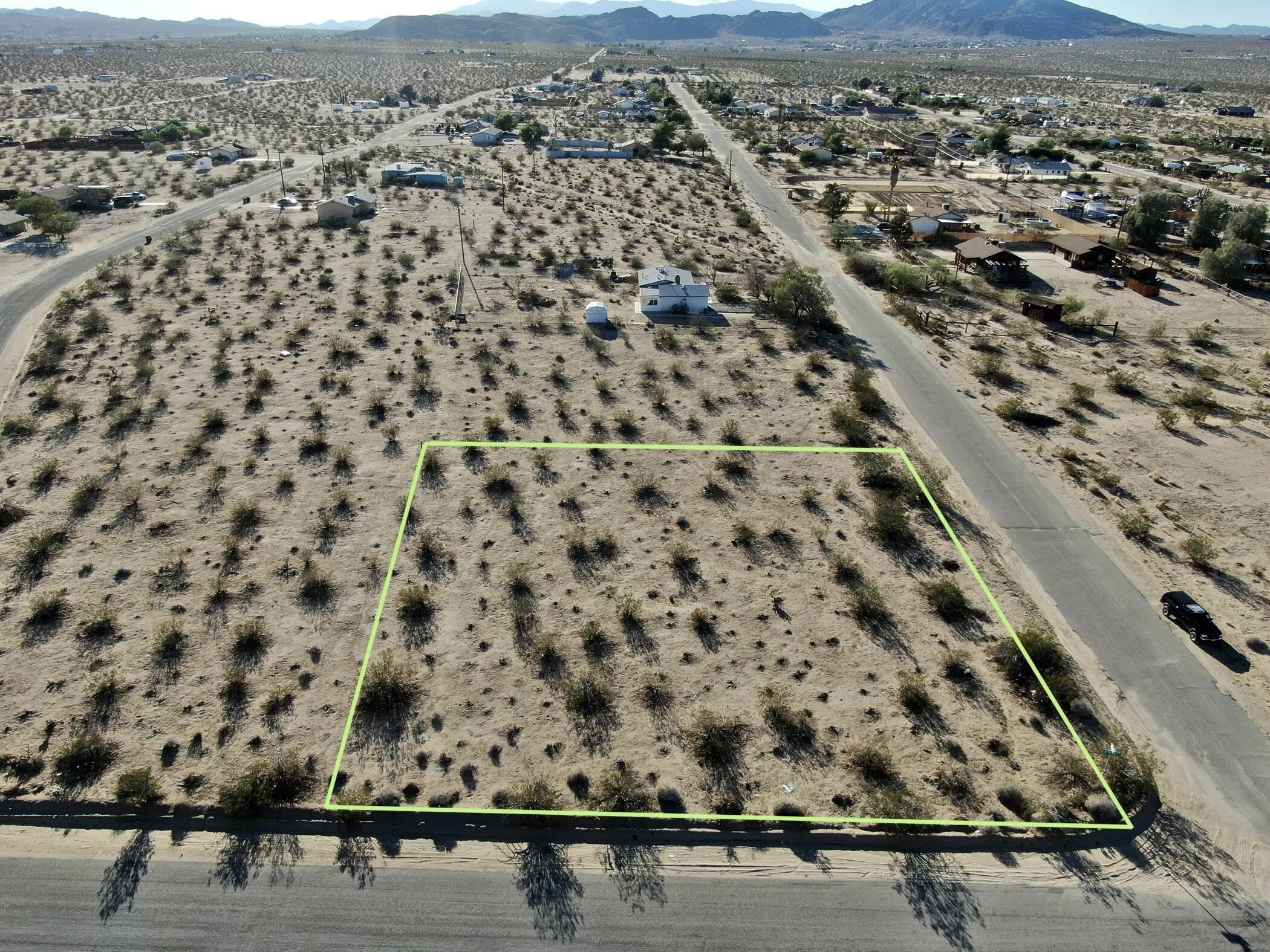 110 Jadeite Street Joshua Tree, CA 92252 - Photo 5 of 12 an aerial view of house with yard