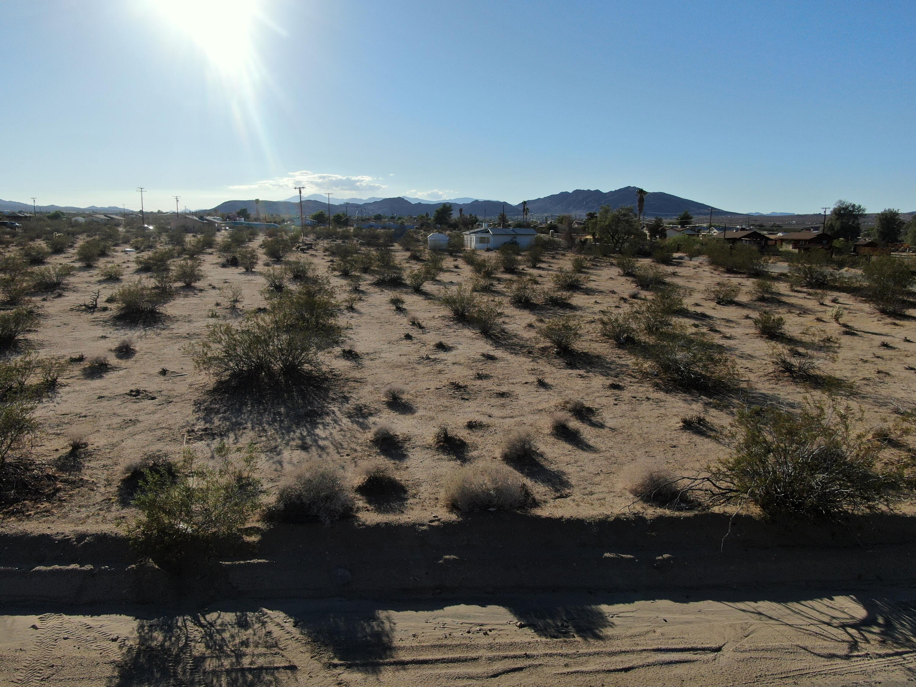 110 Jadeite Street Joshua Tree, CA 92252 - Photo 6 of 12 view of city and mountain