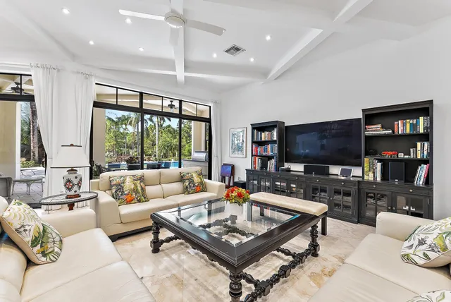 a open kitchen with stainless steel appliances granite countertop a stove and a sink
