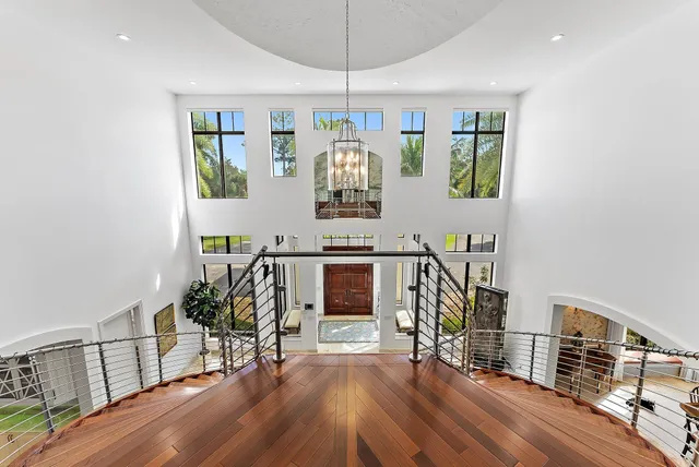 a bed room with a bed and a tv