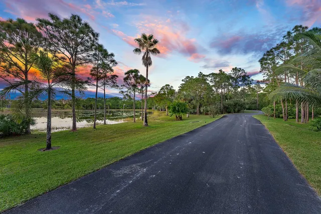 an aerial view of a house with a garden