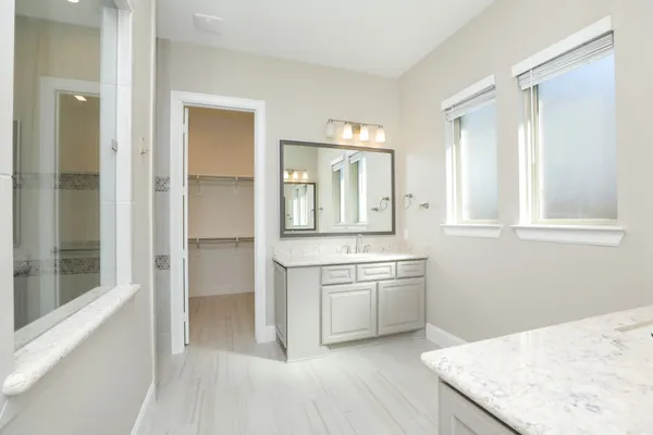 a kitchen with stainless steel appliances granite countertop a stove and a sink