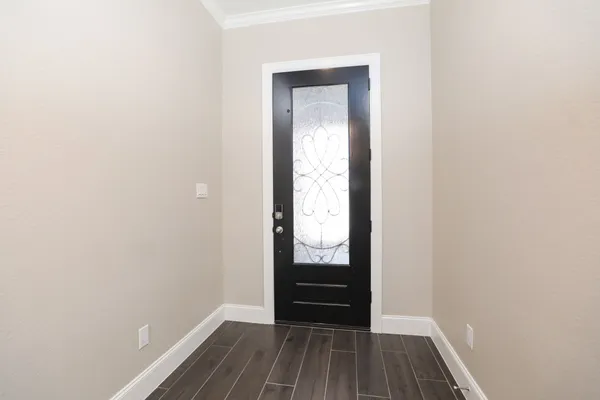 a view of walk in closet with wooden floor