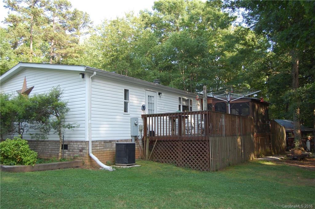 157 Green Road Star, NC 27356 - Photo 2 of 7 a view of a backyard with a small cabin