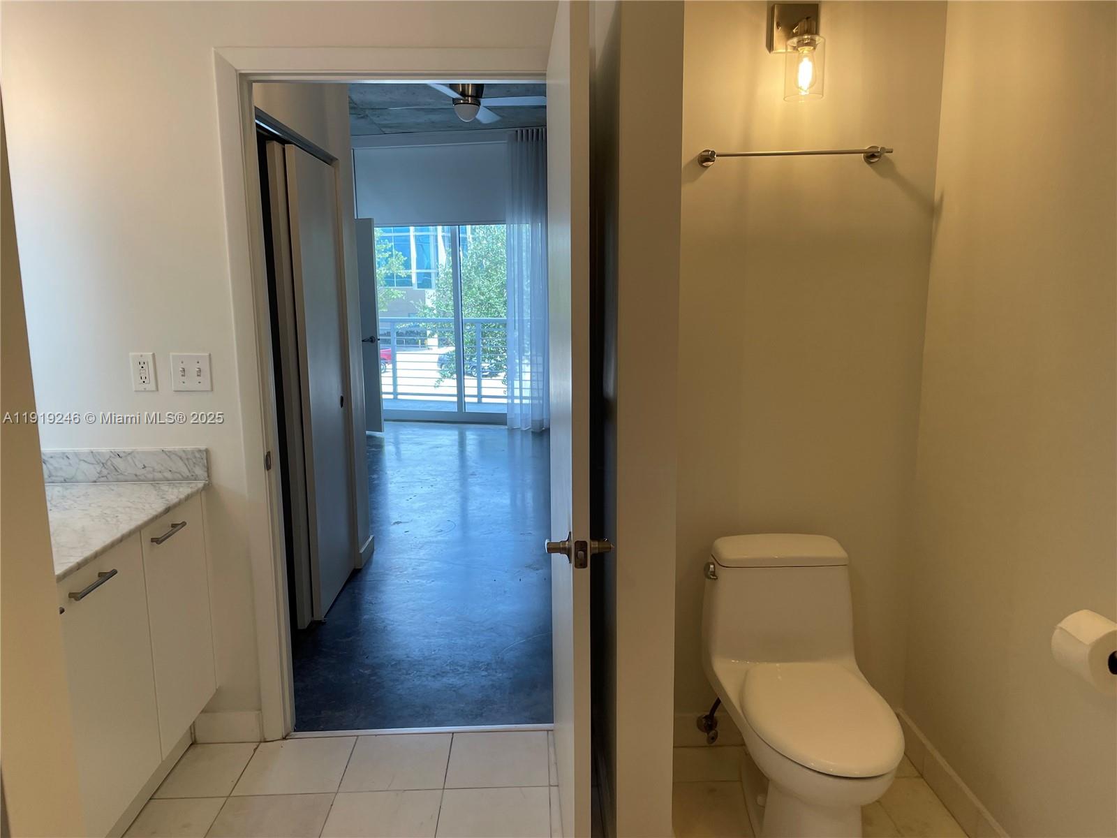 2001 Meridian Avenue, Unit 330 Miami Beach, FL 33139 - Photo 12 of 19 a bathroom with a toilet