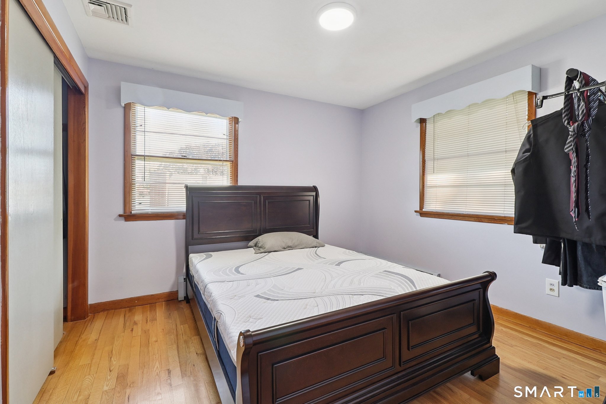 72 Hilltop Road Naugatuck, CT 06770 - Photo 17 of 25 a bedroom with a bed and a window