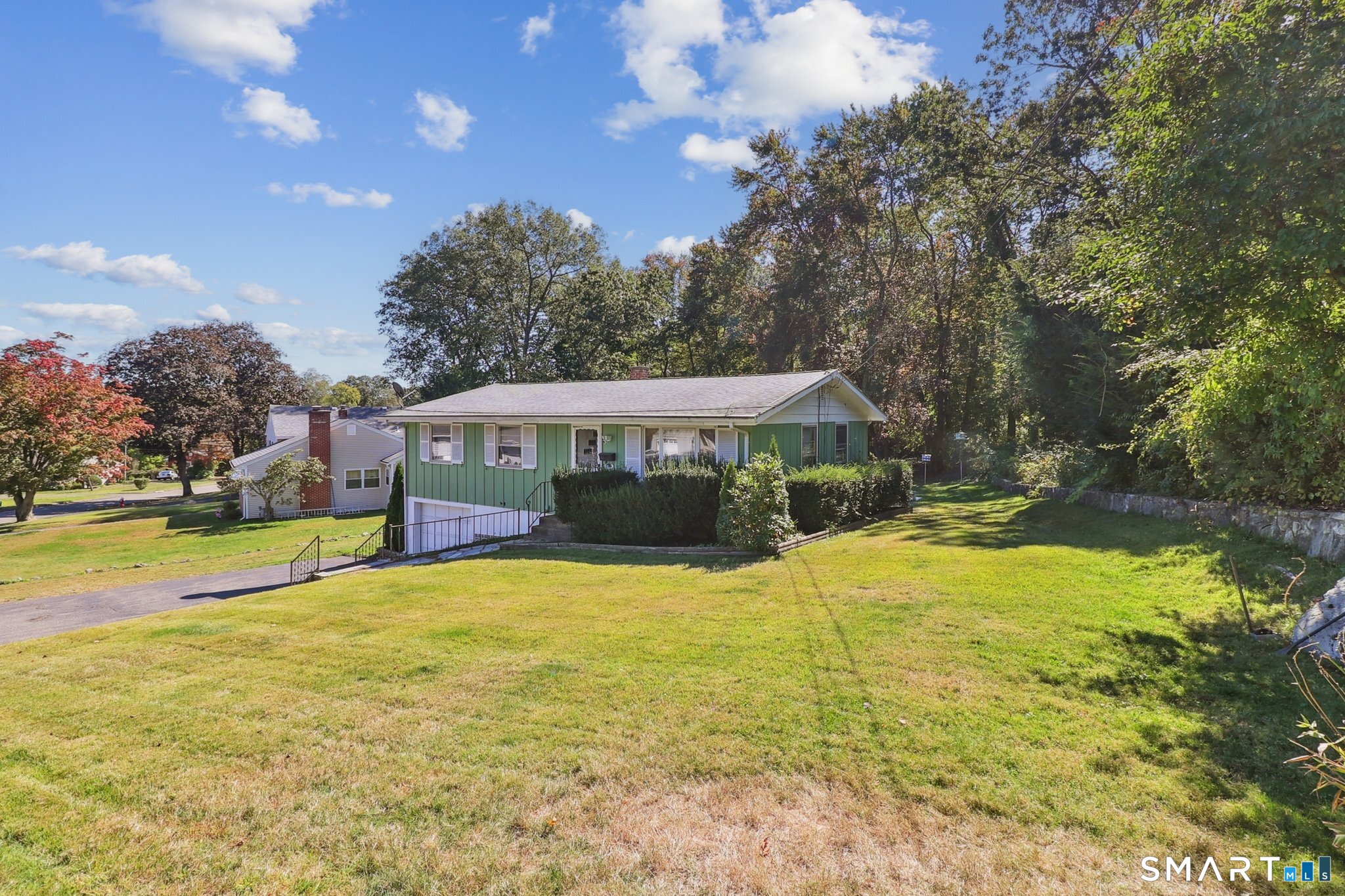 72 Hilltop Road Naugatuck, CT 06770 - Photo 2 of 25 a view of a house with swimming pool and a yard