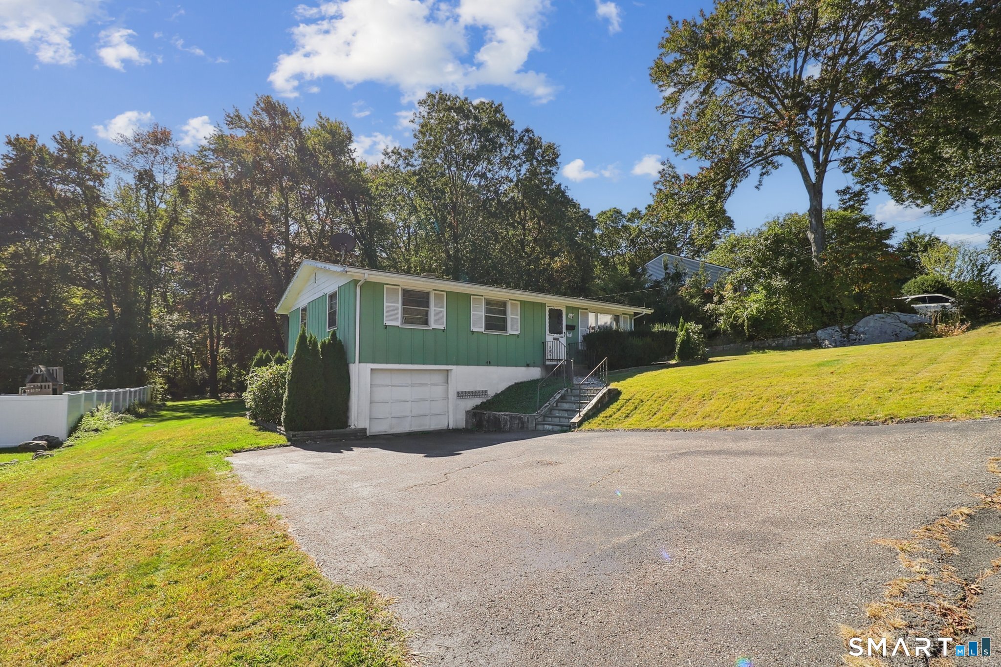 72 Hilltop Road Naugatuck, CT 06770 - Photo 3 of 25 a view of a house with swimming pool and a yard