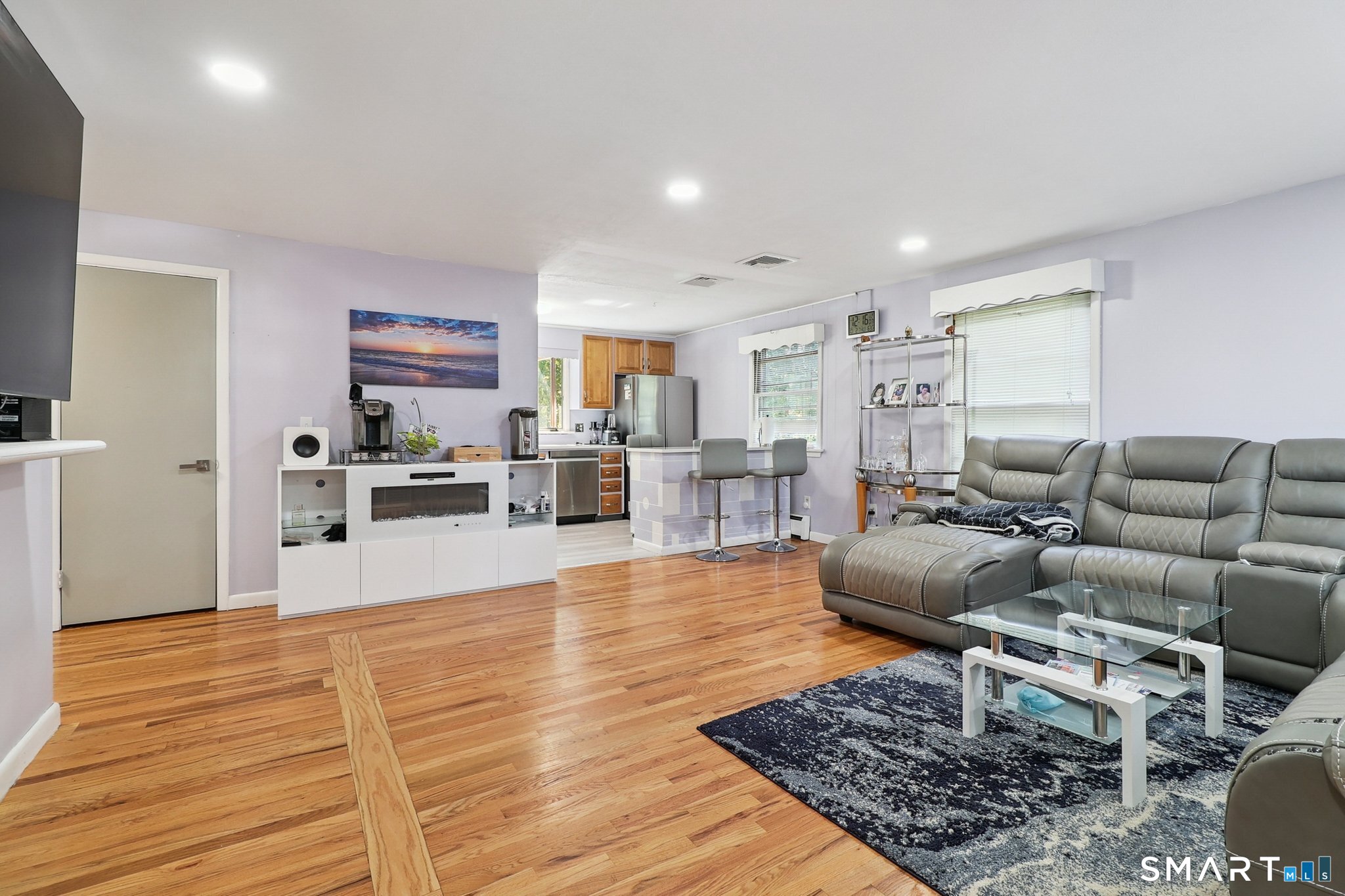 72 Hilltop Road Naugatuck, CT 06770 - Photo 6 of 25 a living room with furniture and a wooden floor